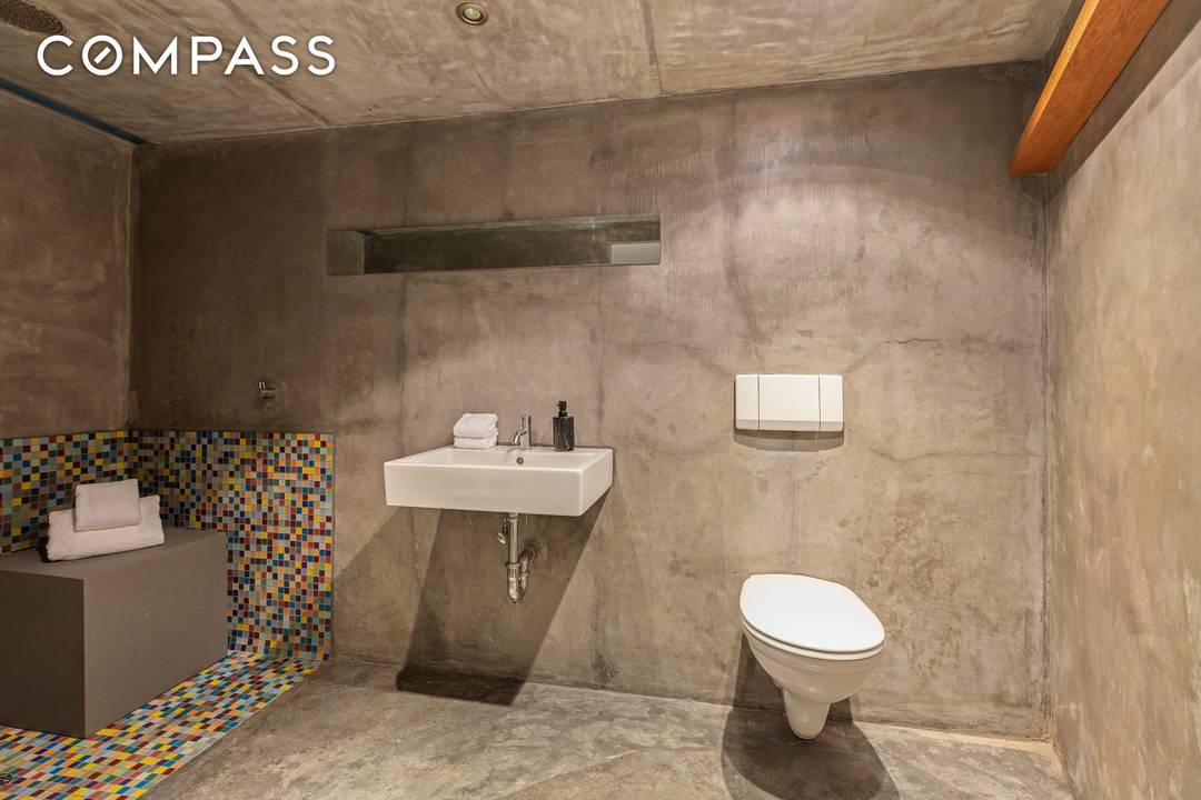 A charming West Village duplex where loft scale living meets modern elegance.