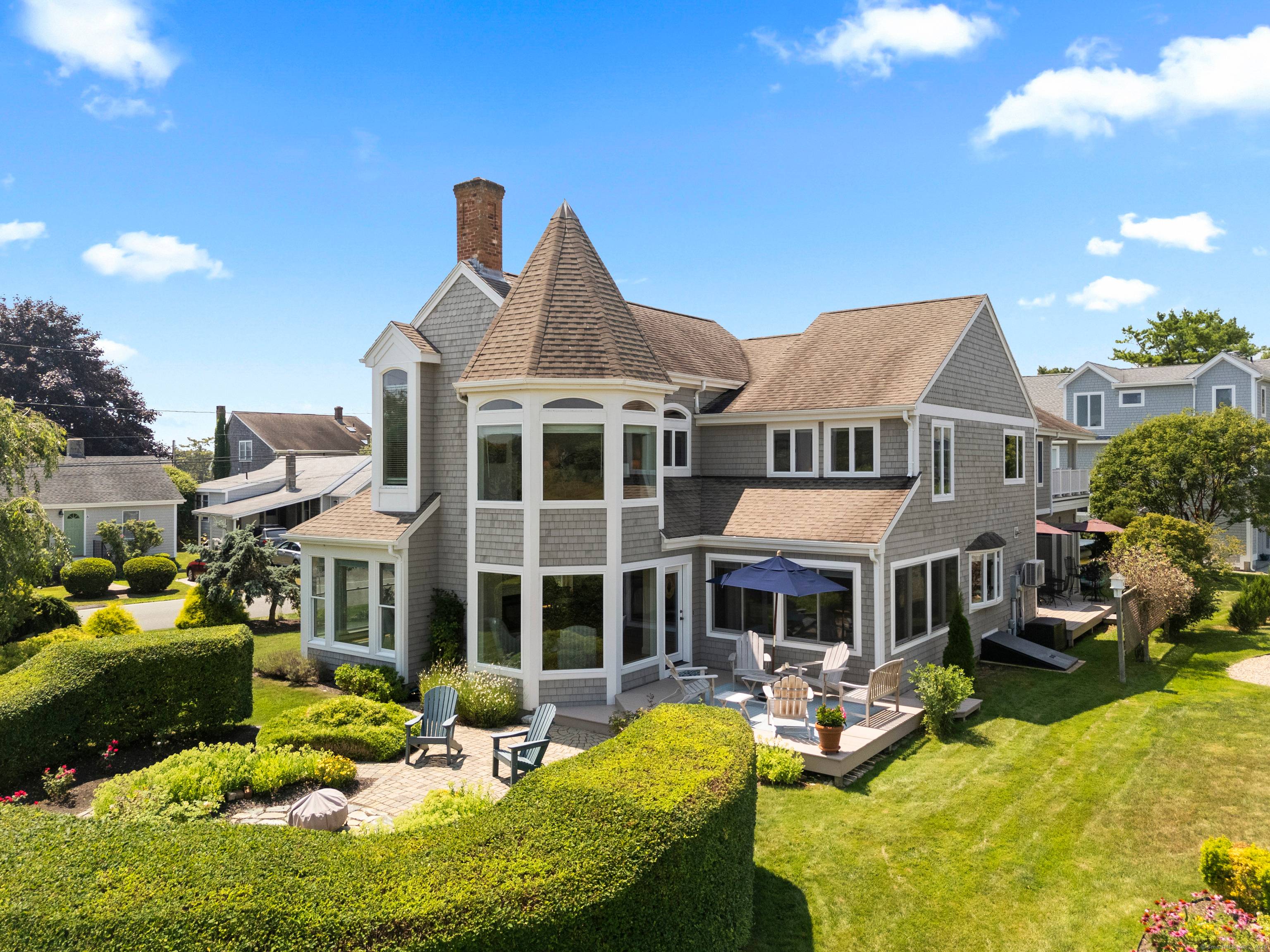 Welcome to 4 Island Ave., Groton Long Point a rare coastal gem where privacy meets convenience.