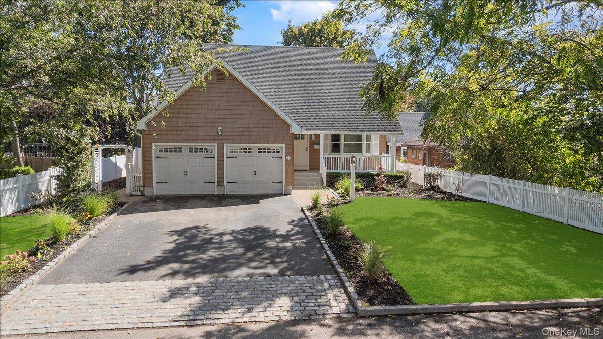 Welcome to 94 Carman Pl in Amityville Village !