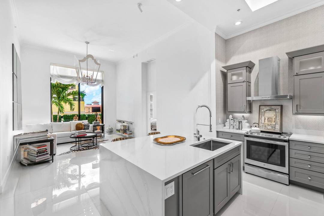 In the heart of downtown West Palm Beach, you'll find a stunning fully renovated condo that exudes modern luxury.