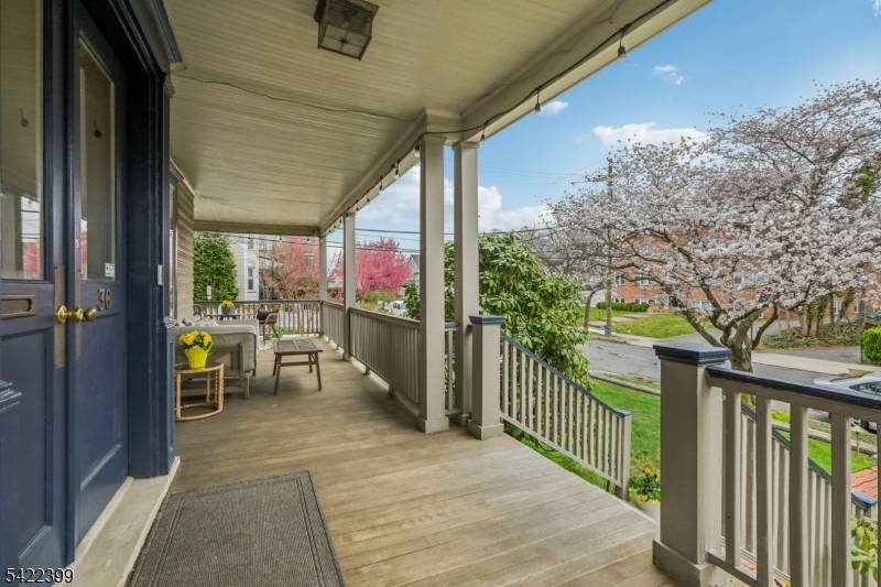 This stunning and spacious Victorian set on a corner lot, lined with charming cherry blossom trees, embodies the sought after Montclair lifestyle, where the city meets the suburbs.