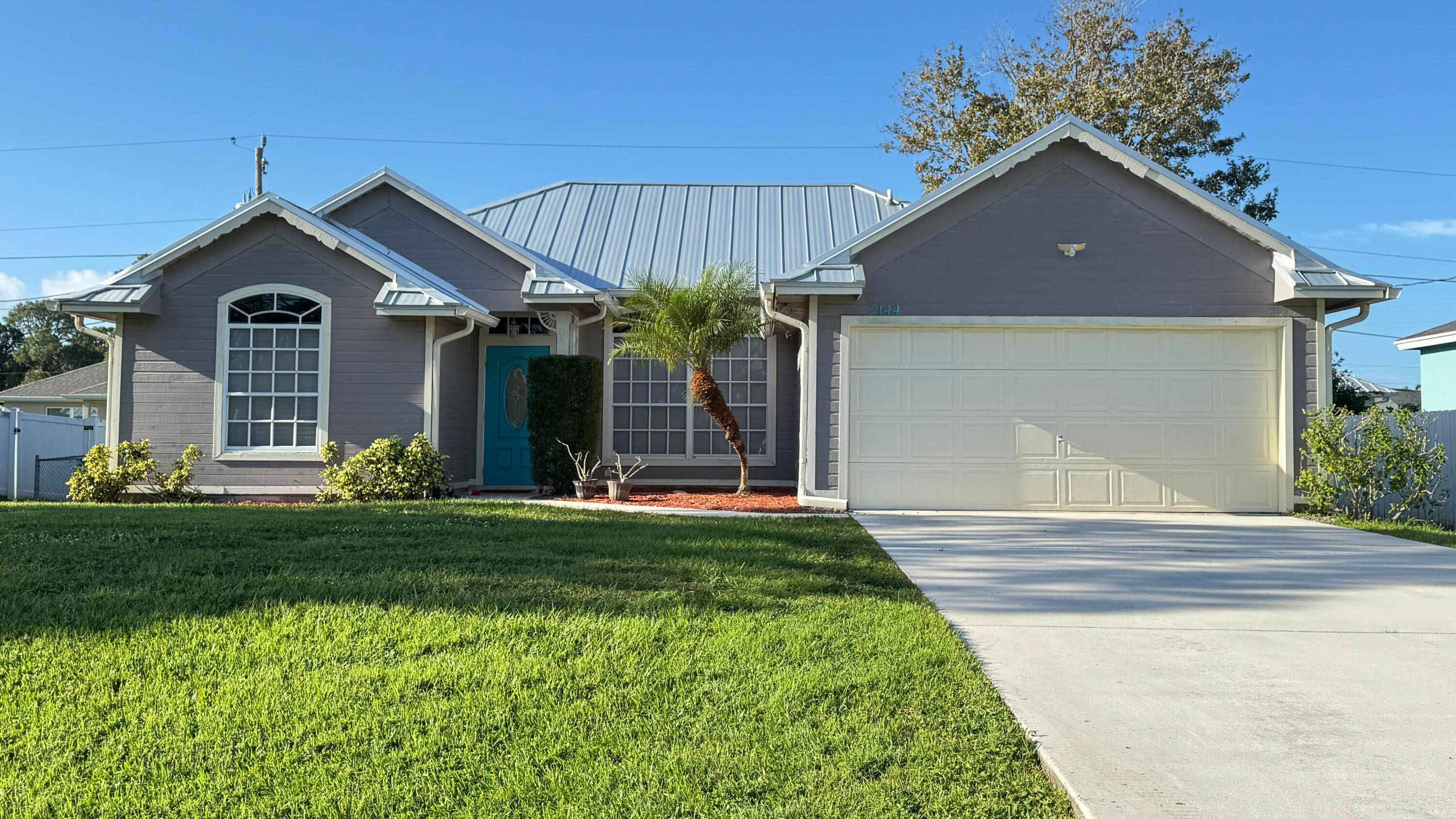 Located in a peaceful neighborhood, this delightful three bedroom home is just minutes from I 95 and Port Lucie's vibrant dining, shopping, and entertainment scene.
