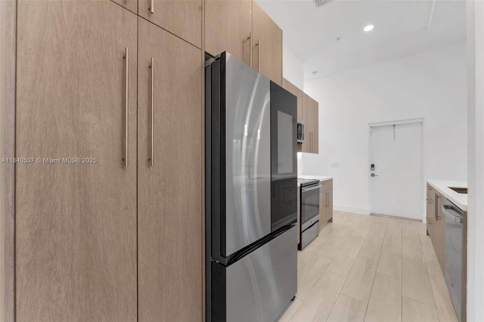 Sleek, stylish, and sun drenched this corner townhome in Plantation delivers 1, 672 sq ft under air and nearly 2, 000 sq ft including a 2 car garage.