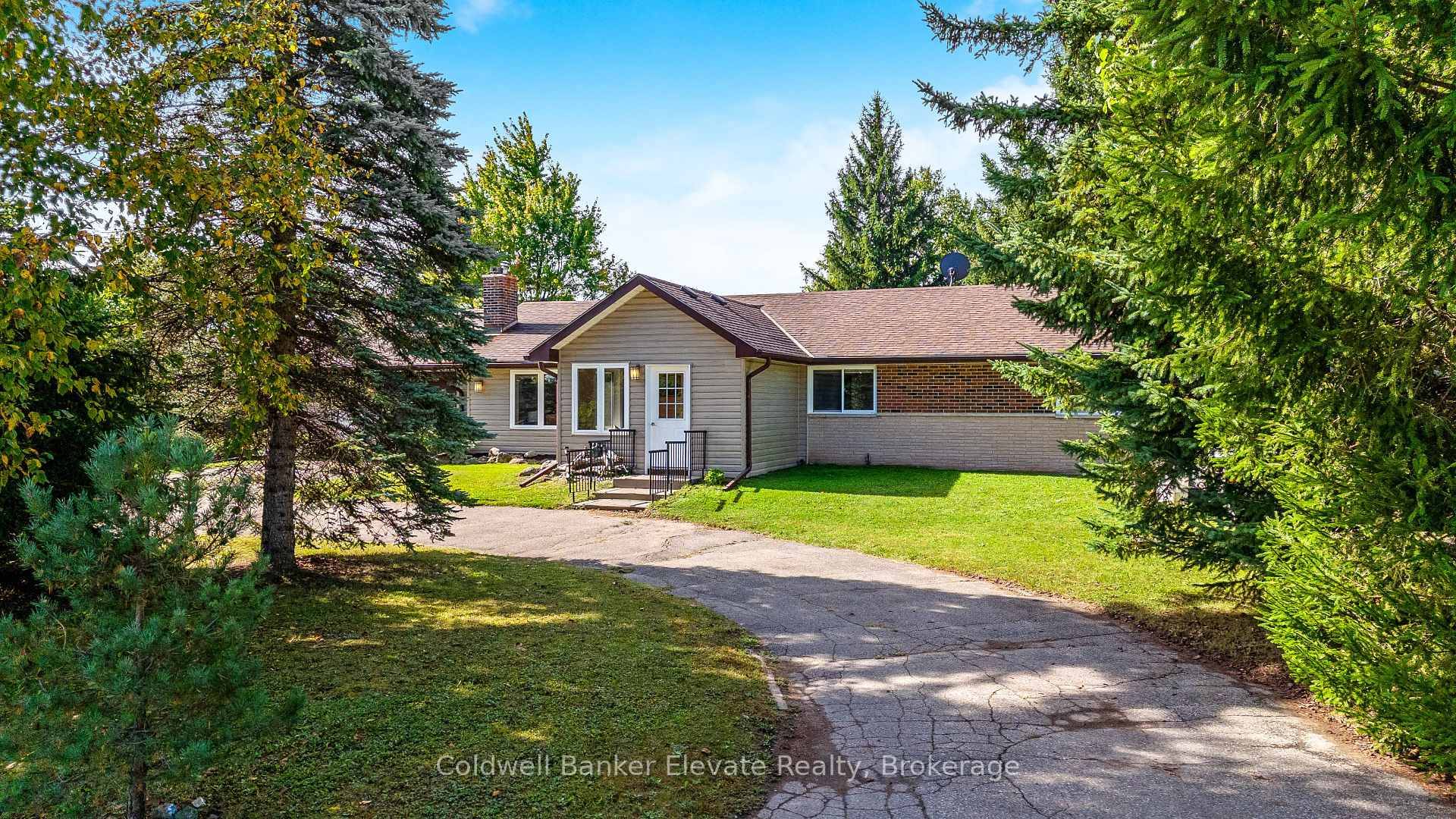 This updated bungalow with plenty of country charm and modern convenience is tucked away in rural Halton Hills, close to the hamlet of Ballinafad.