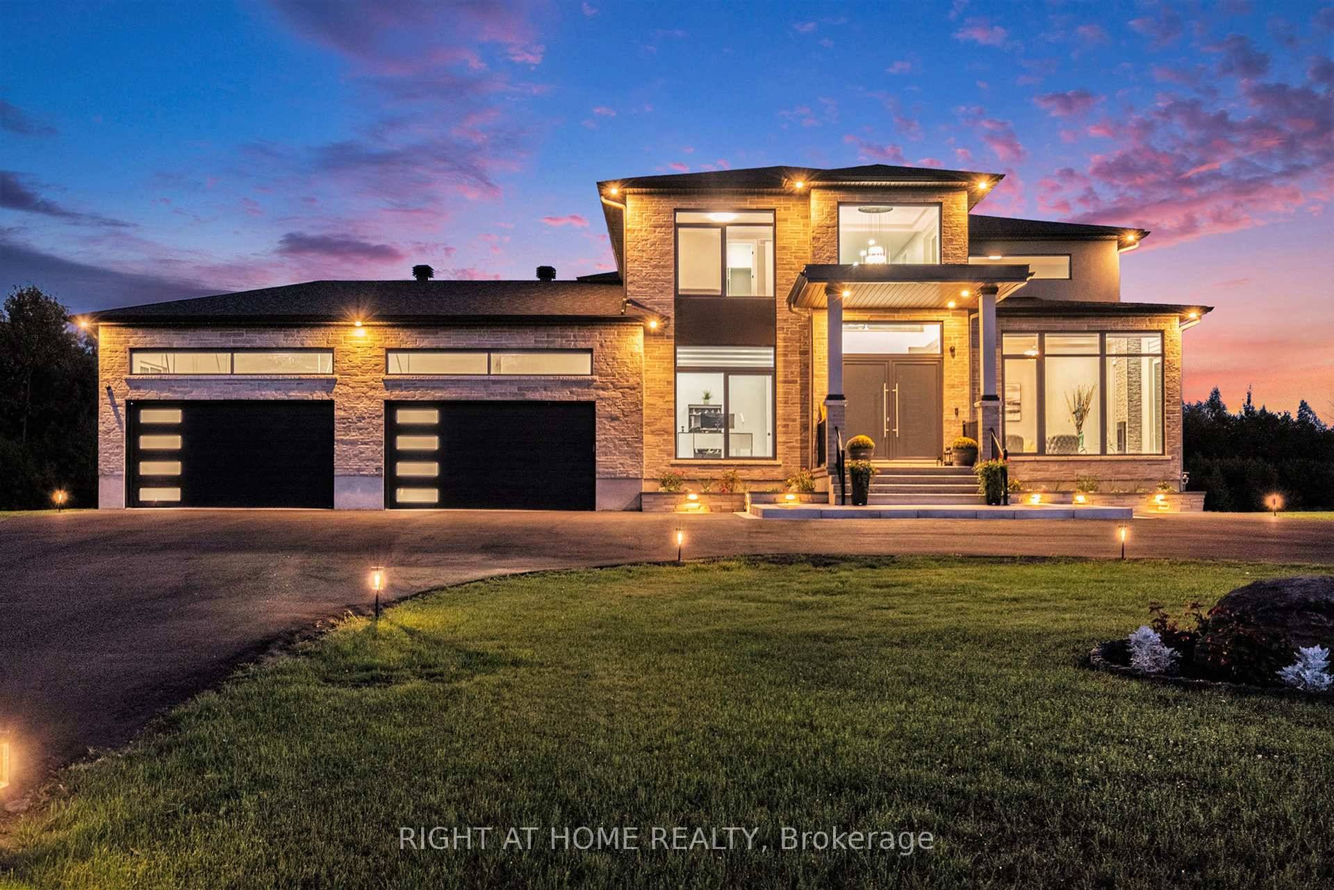 Welcome to this exquisite custom built 2 storey residence set on a private two acre estate lot in the sought after community of Emerald Links.