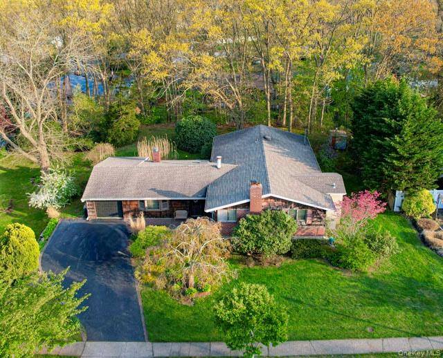 This Expanded Ranch Has 4 Bdrms 2 Full Baths, Enlarged Eat in Kitchen with Breakfast Area, Huge Family Room, 2 Wood Burning Fireplaces, and a Wood Burning Stove, a Skylight ...