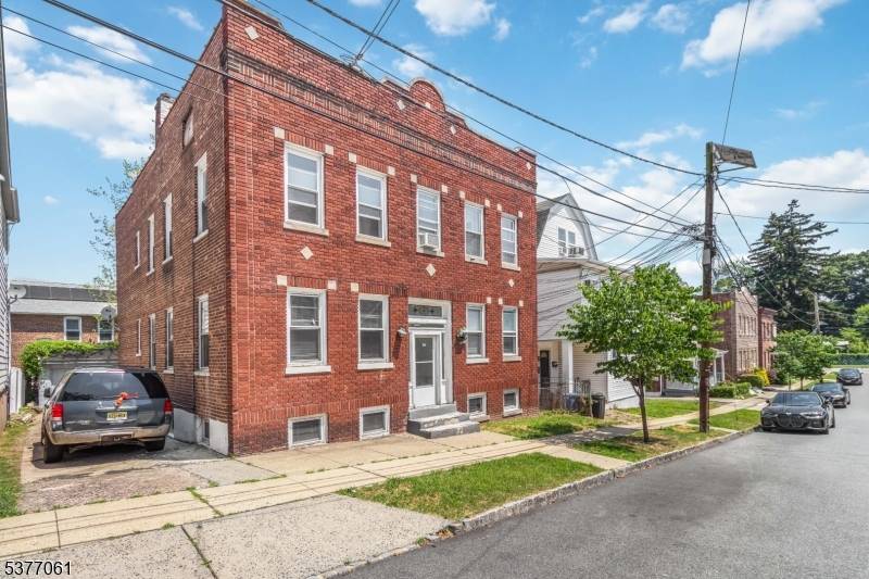 Investor alert ! Solid brick 4 unit property located in the heart of Downtown Montclair, just moments from major shopping centers, restaurants, and public transportation.