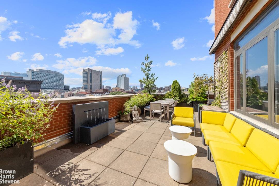 Imagine yourself unwinding on a stunning, professionally landscaped wraparound terrace with open views of Harlem's iconic skyline.