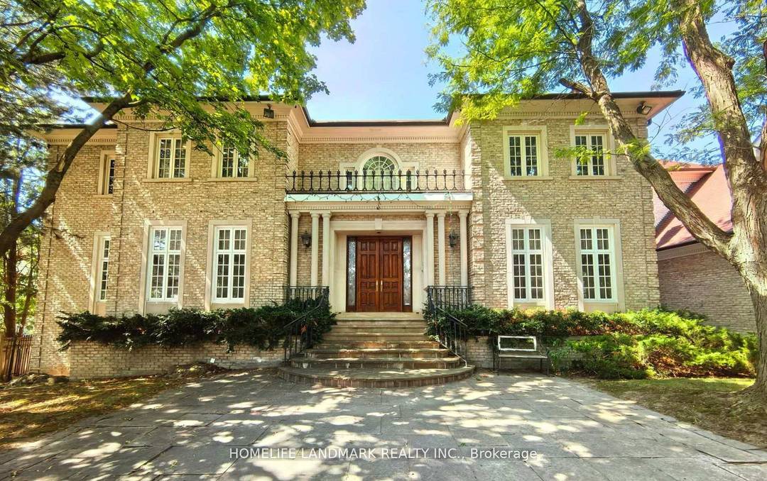 Over 10, 000 Sq. Ft. of Luxurious Living Space on Ravine Lot !