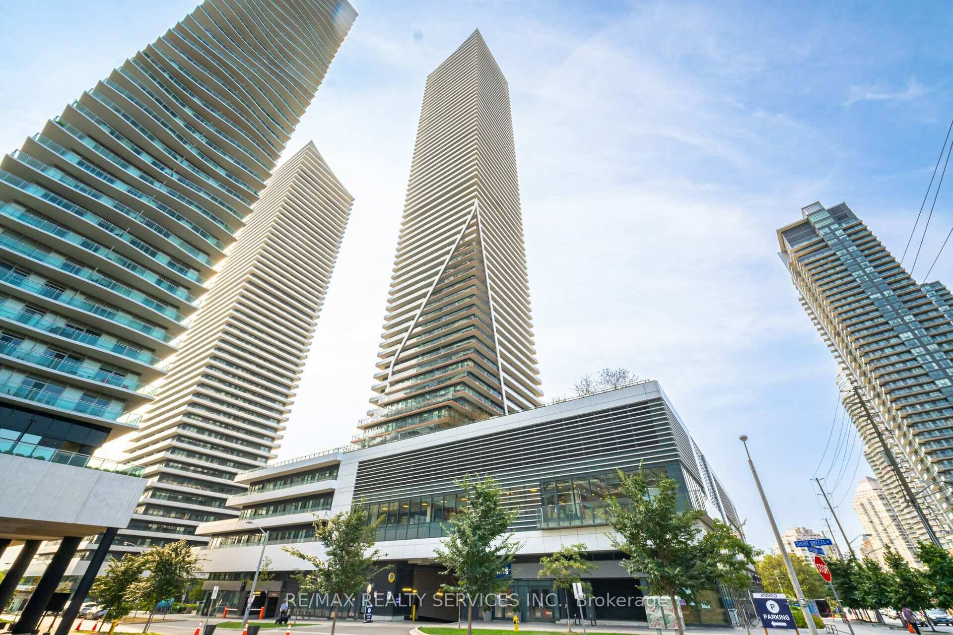 Bright And Spacious 2 Bed 2 Bath Condo With Stunning Views Of The Lake And CN Tower From this Corner Unit With Wrap Around Balcony.