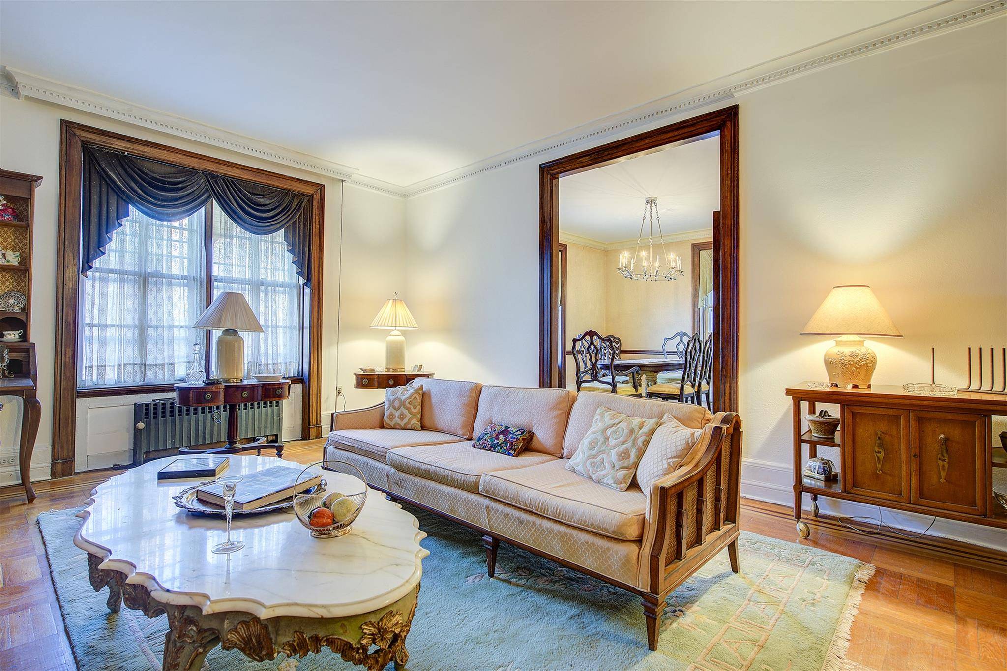 Experience timeless charm and sophisticated living at The Chateau, a distinguished co op built in 1922, nestled in the heart of the Jackson Heights Historic District.
