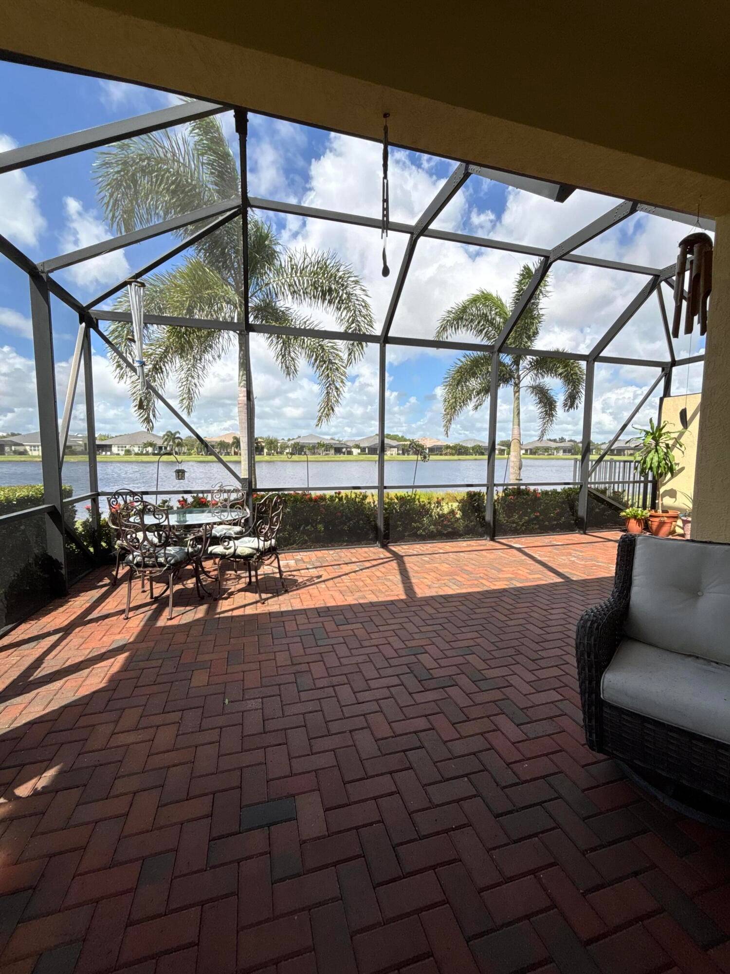 BUILT IN 2021, this IMMACULATE 55 villa offers 2 bedrooms, a DEDICATED OFFICE WITH ELEGANT FRENCH DOORS, and a separate laundry room.