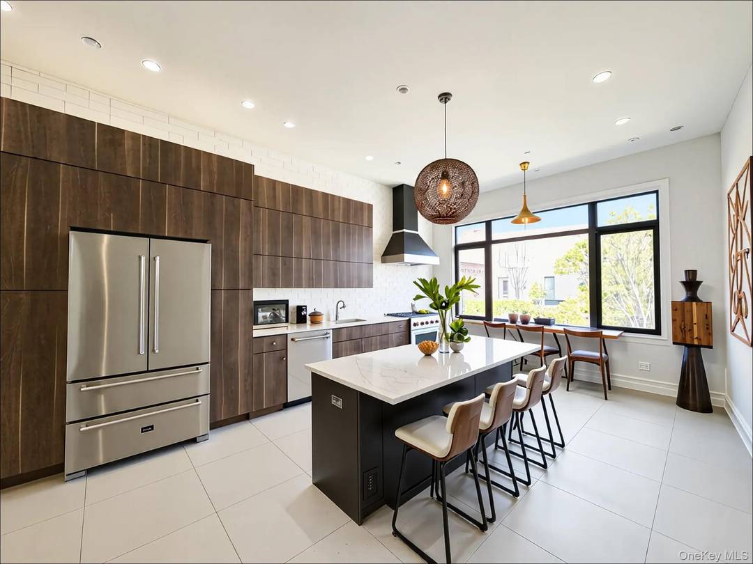 Welcome to 333 Tompkins Avenue 2, a striking and expansive four bedroom, four bathroom home in the heart of Bed Stuy.