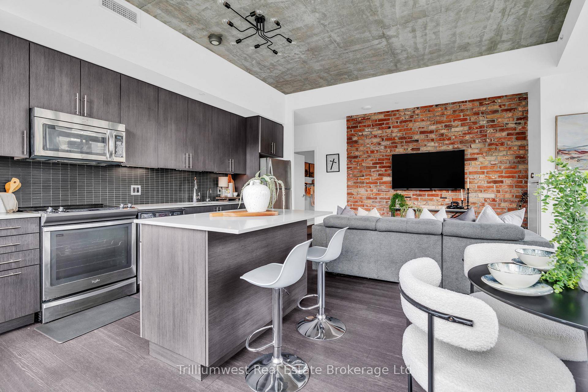 Step into contemporary luxury with this bright and stylish 1 bedroom corner unit, distinguished by premium loft style upgrades, soaring 10 foot concrete ceilings, and floor to ceiling windows spanning ...