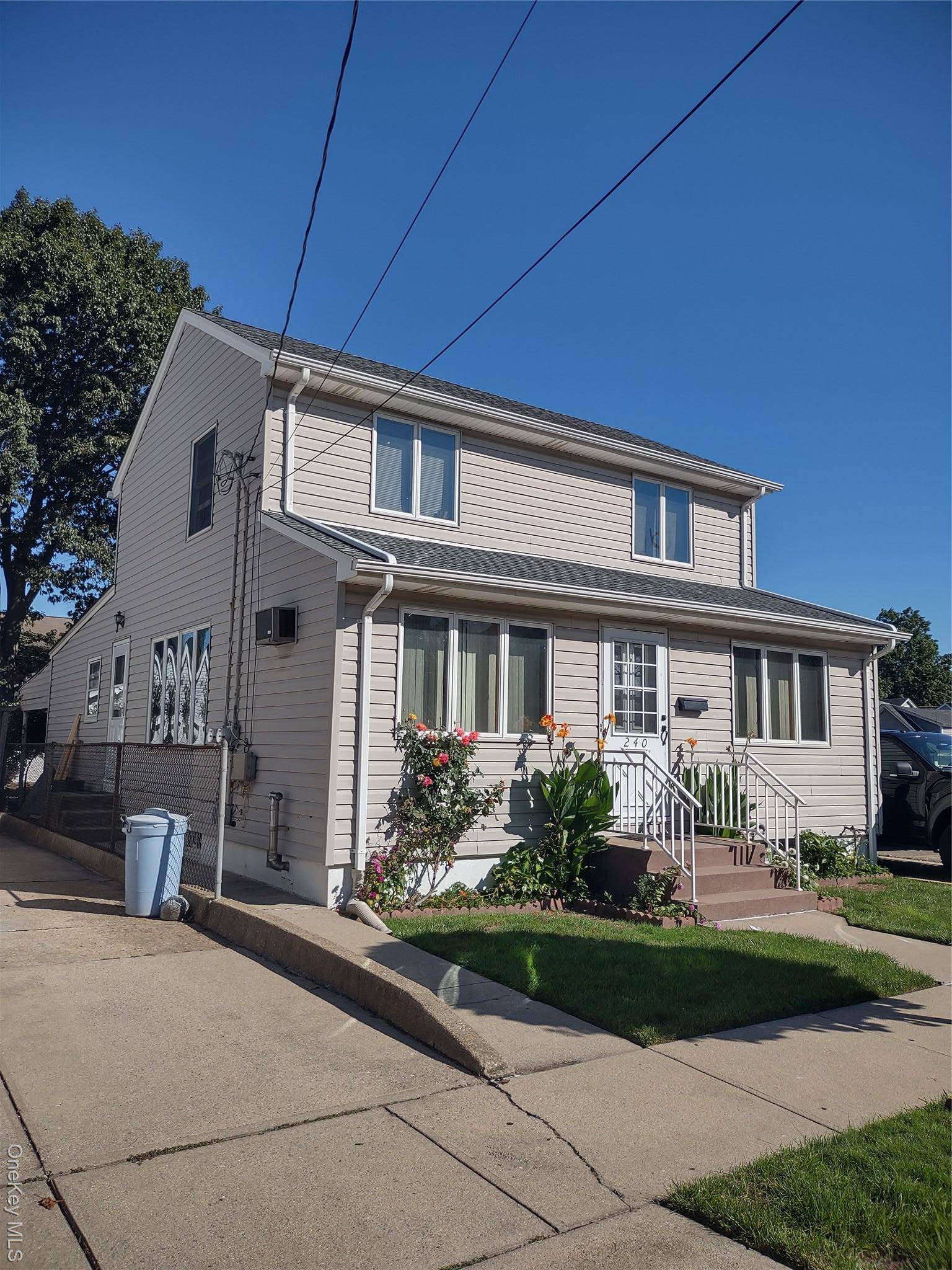 large colonial in center of the village of Mineola with garage parking for few cars and the home have 4 plus a kids room, full kitchen, living room, 2 full ...