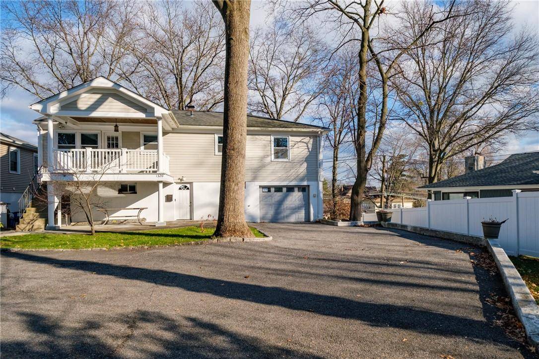 Welcome to this beautifully updated Hi Ranch nestled off a quiet cul de sac in the desirable Harbor Heights section of Mamaroneck.