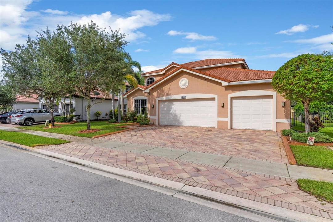 Welcome to this stunning 5 bedroom 3 bath home situated in a gated community with resort style amenities.