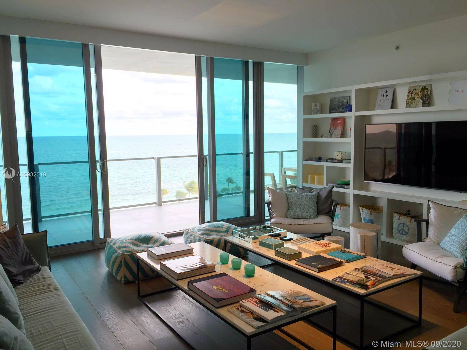 Amazing 2 bedroom den direct ocean view unit in the newest most exclusive building in Key Biscayne.