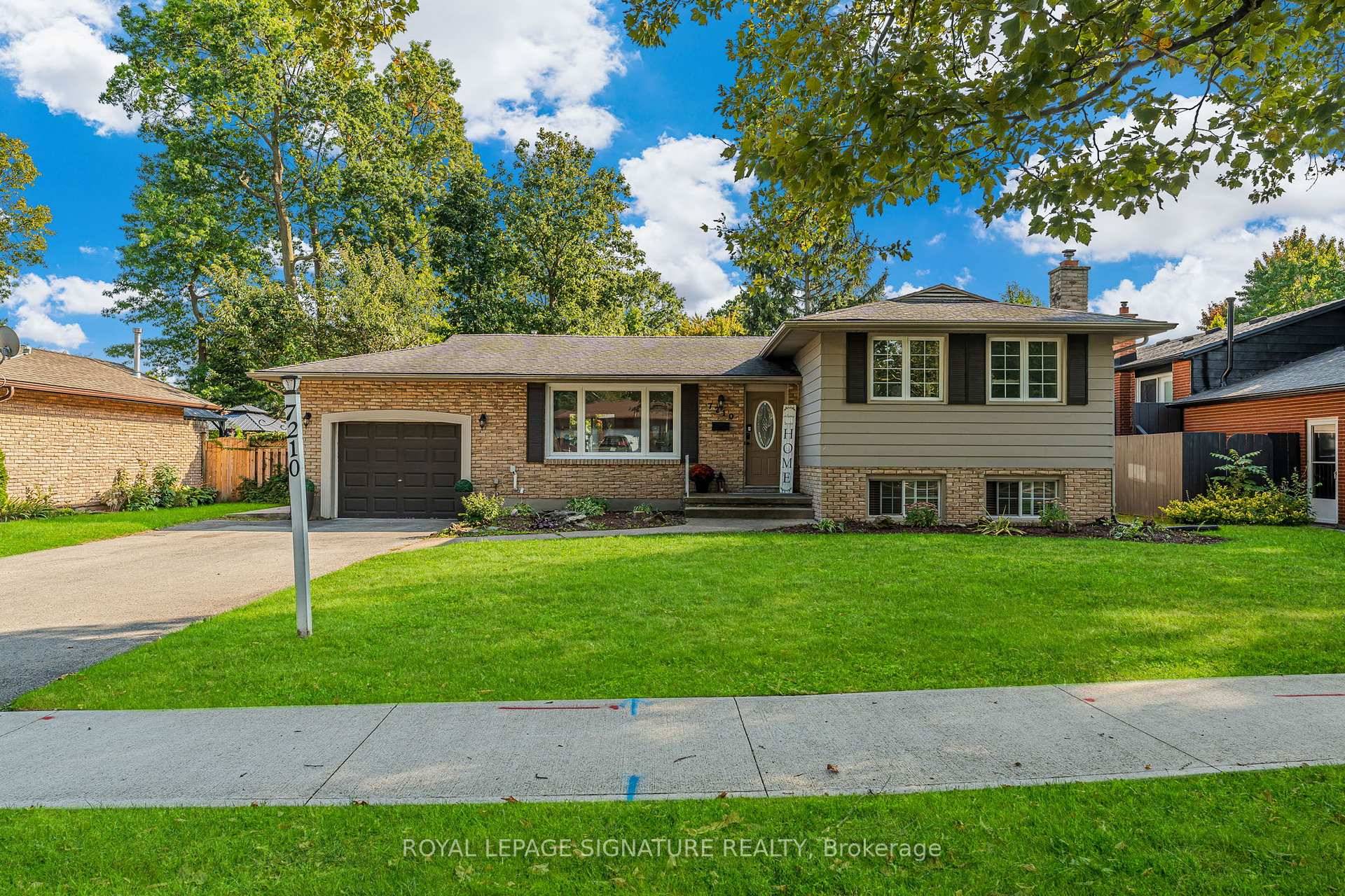 Prestigious Living in Sought After Rolla Woods !