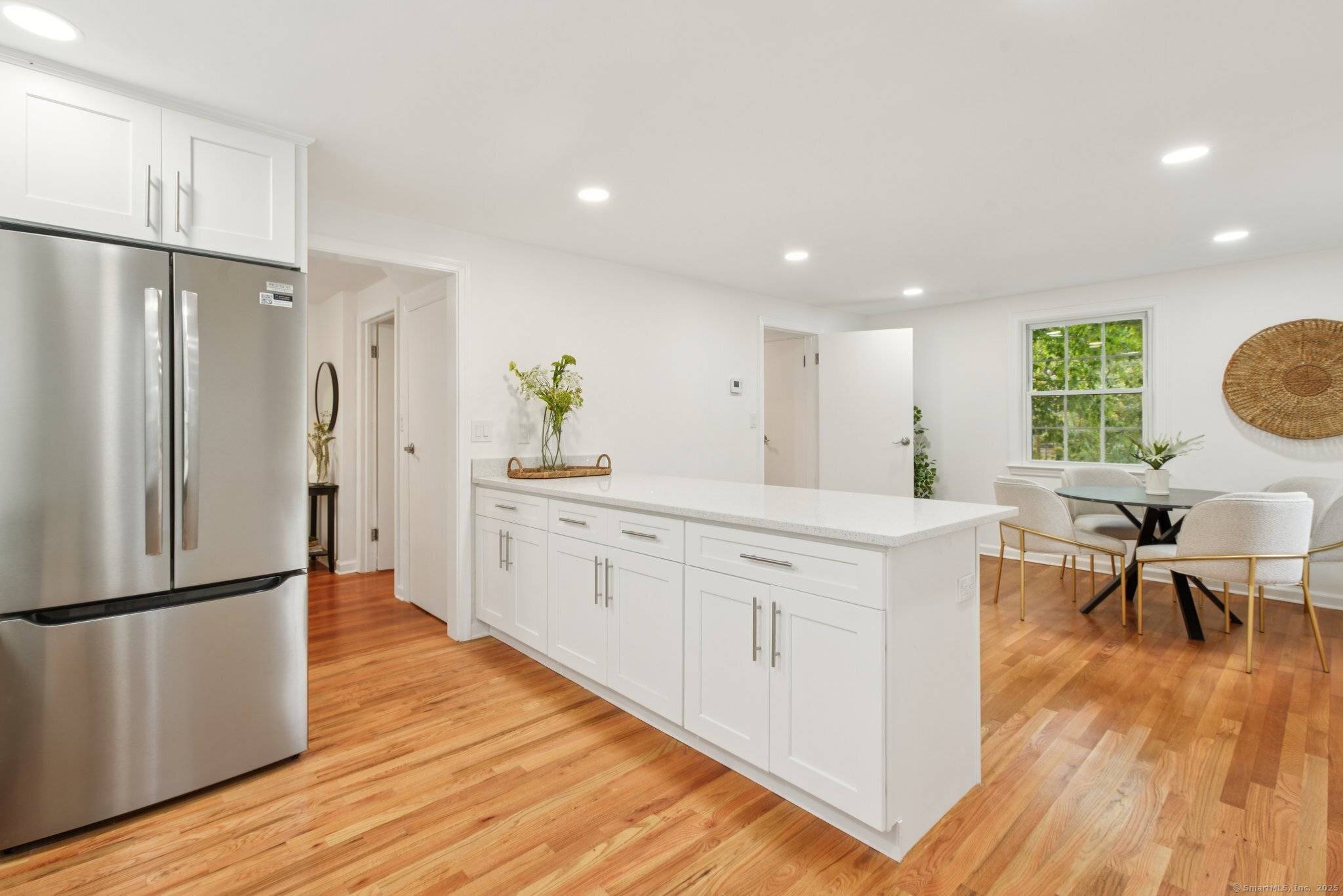 This Beautifully renovated 1951 brick Colonial blends timeless character with modern updates !