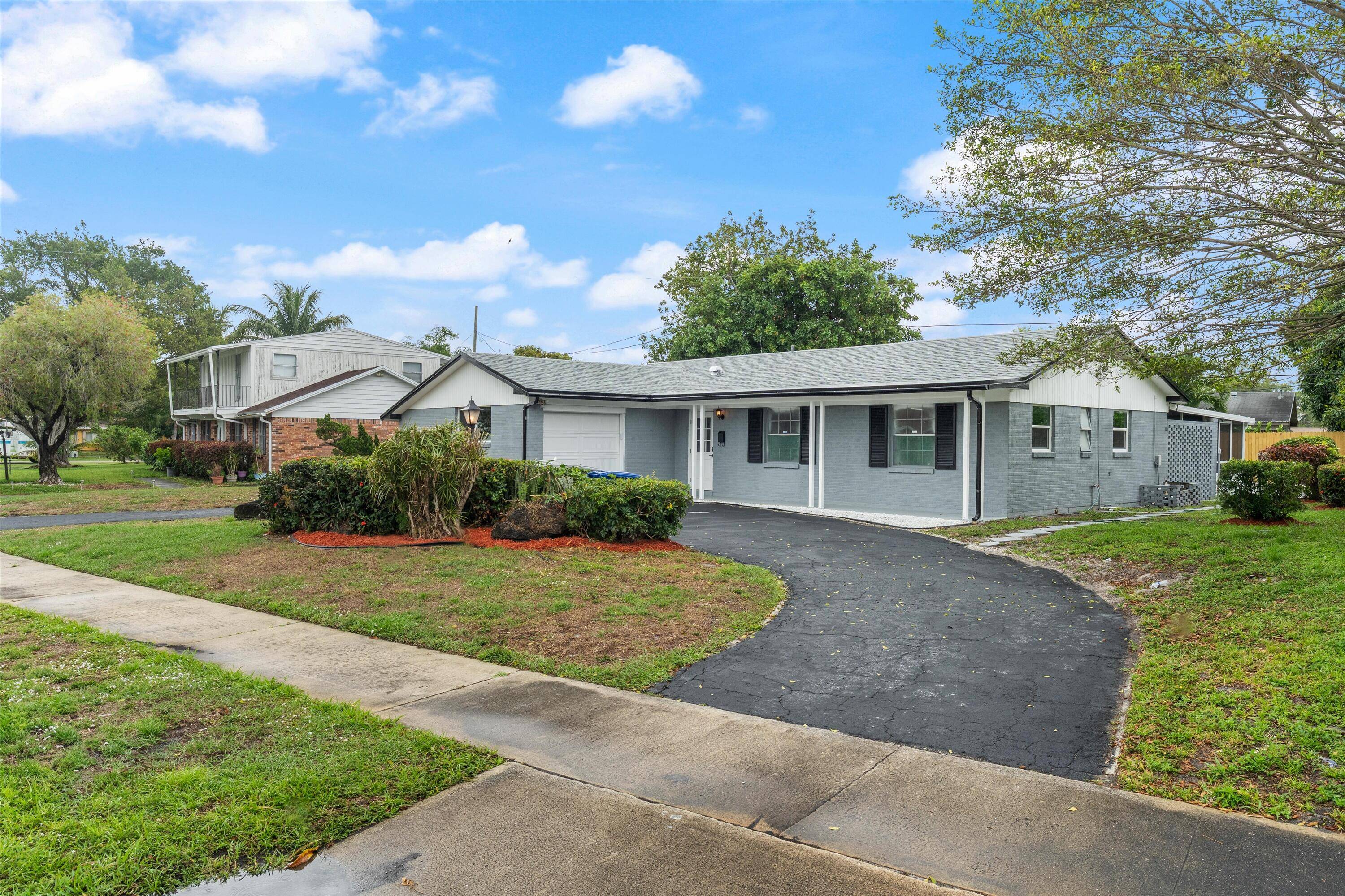 Completely renovated 4 bed, 2 bath home in the heart of Lake Park just minutes from the beach, shopping, dining, and major highways.