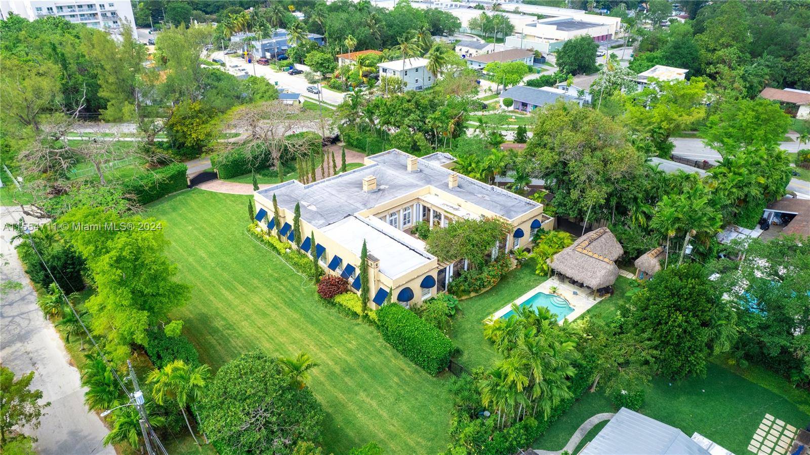 ONCE IN A GENERATION MIAMI MANSION IN A PRIME LOCATION WITH TIMELESS ELEGANCE.