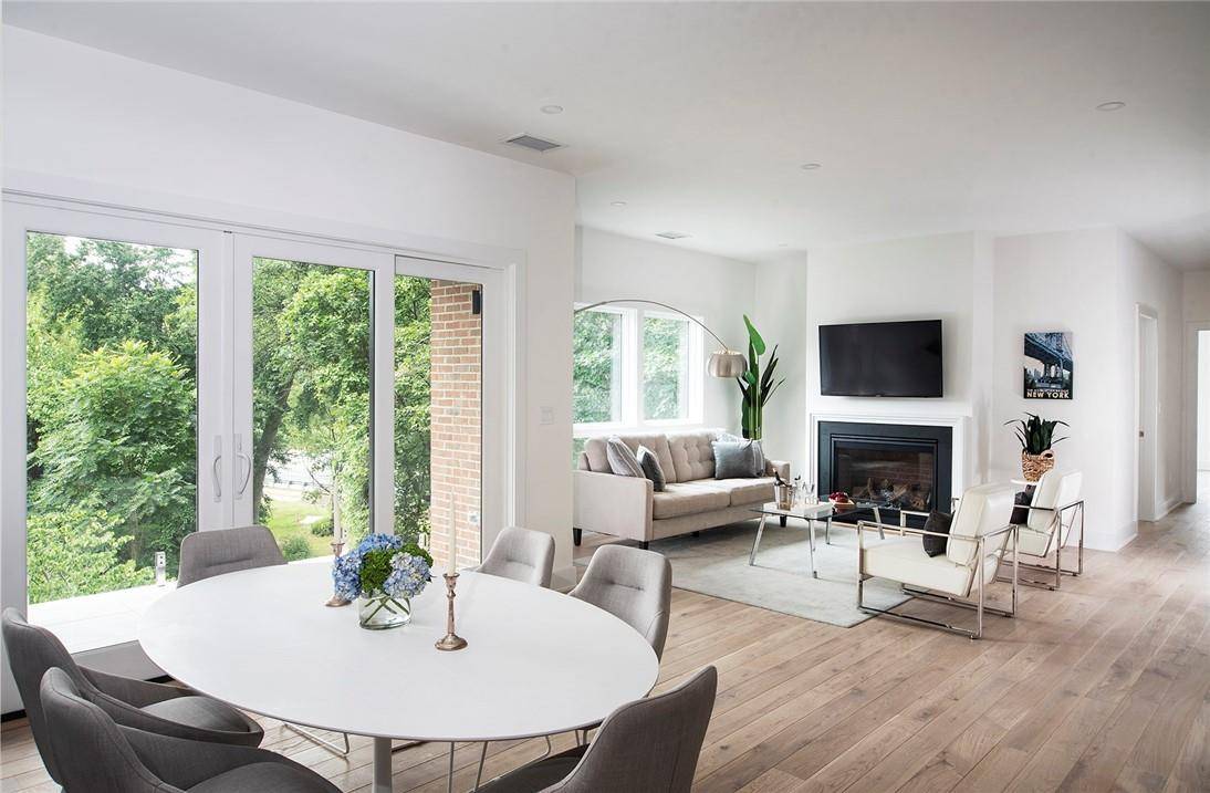 Soaring ceilings and sun drenched rooms greet you each day in this incredible 3 bedroom 3 bath apartment that truly functions like a home.