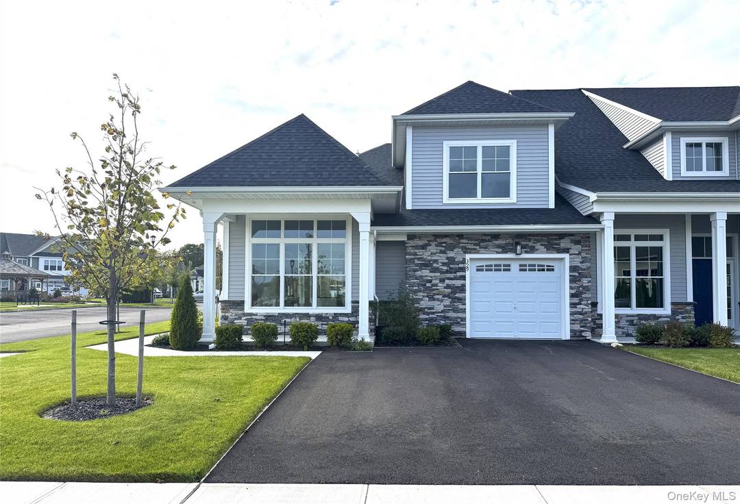 Welcome to Country Pointe Meadows, where modern elegance and timeless comfort meet in this beautifully designed end unit townhome.
