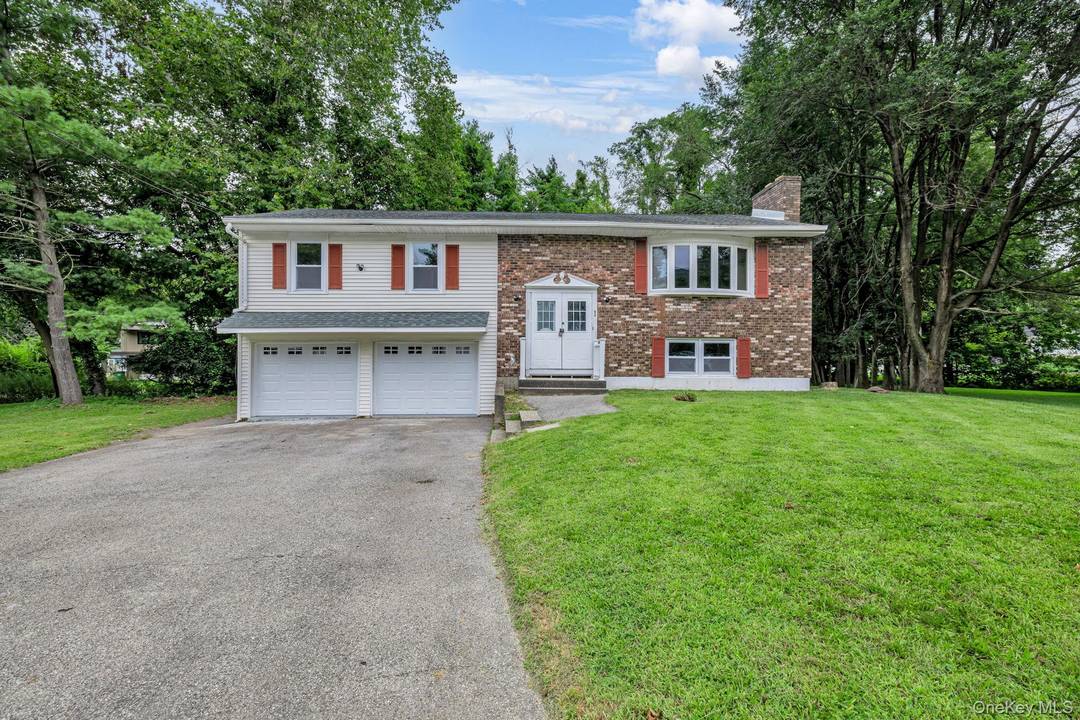 A ton of recent updates in this oversized split level home bringing comfort and convenience.