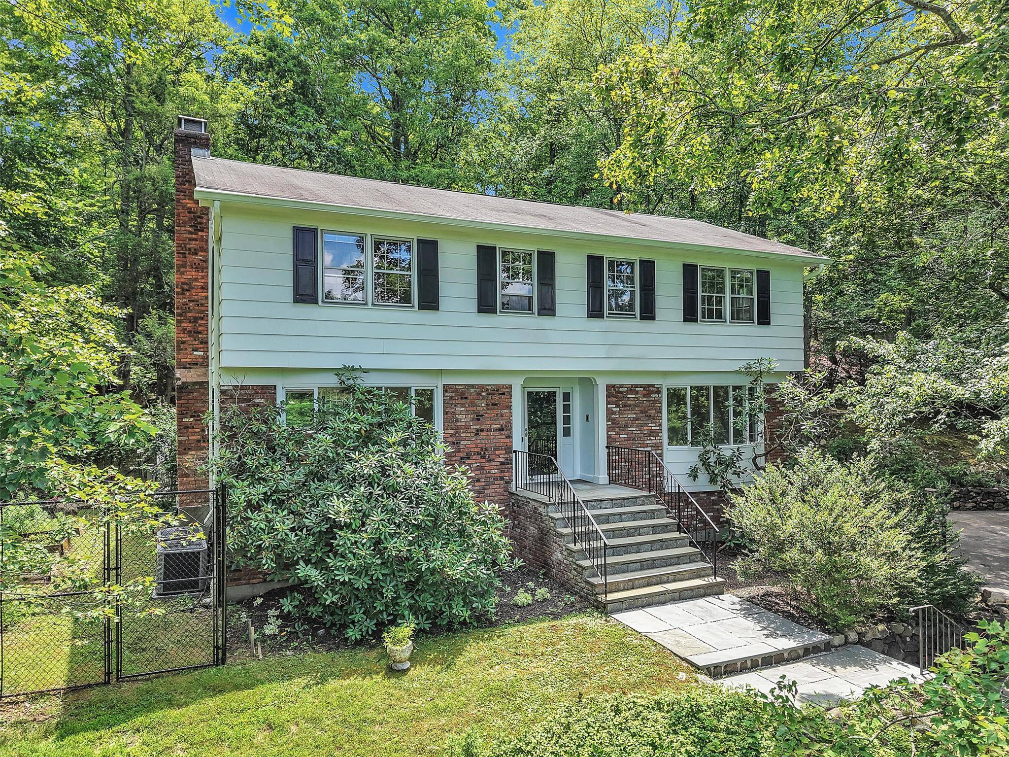 Tucked away in Cortlandt Manor in the Hendrick Hudson School System, nestled on a hill above a quiet, tree lined street is this spacious, classic 4BR, 3 1 2 BTH ...