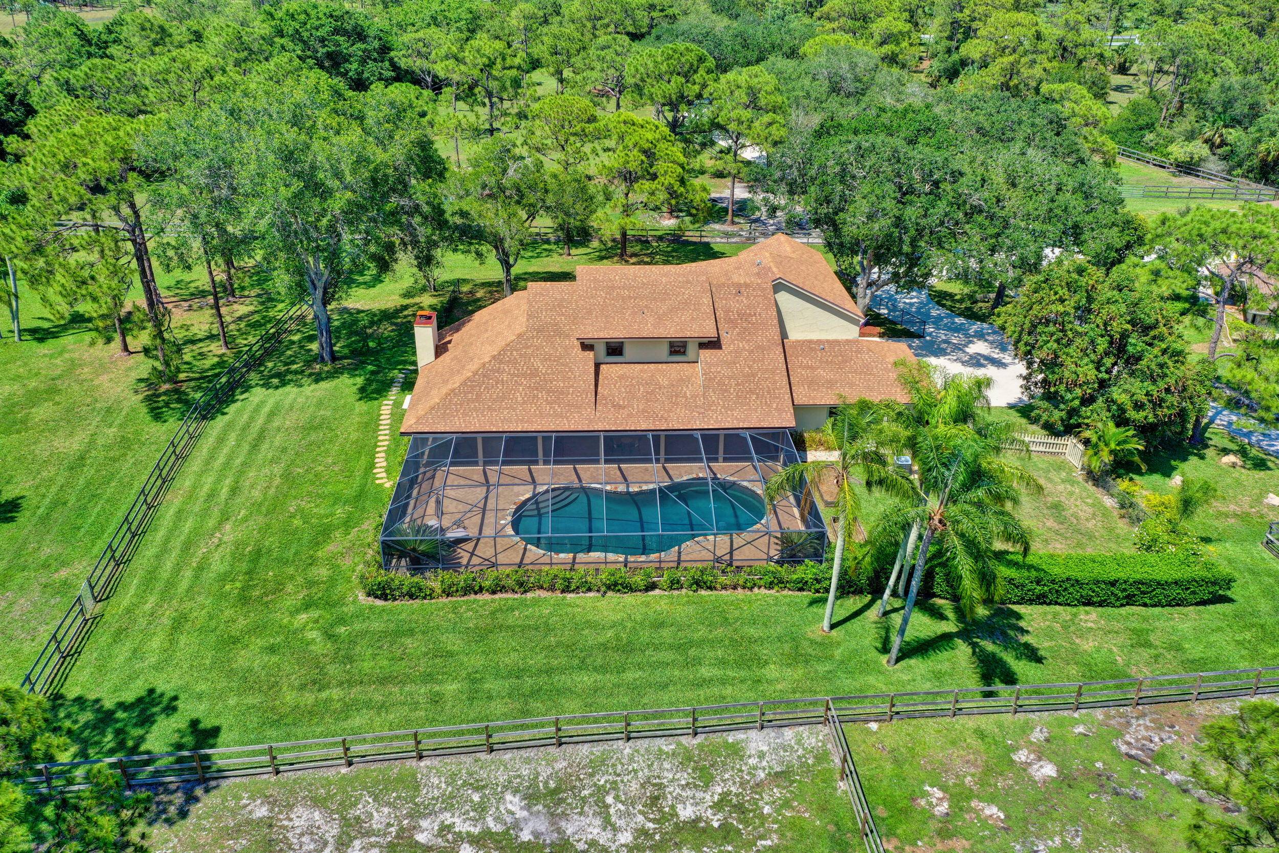 NOTE The main house is offered for rent and is privately nestled on 20 acre estate.