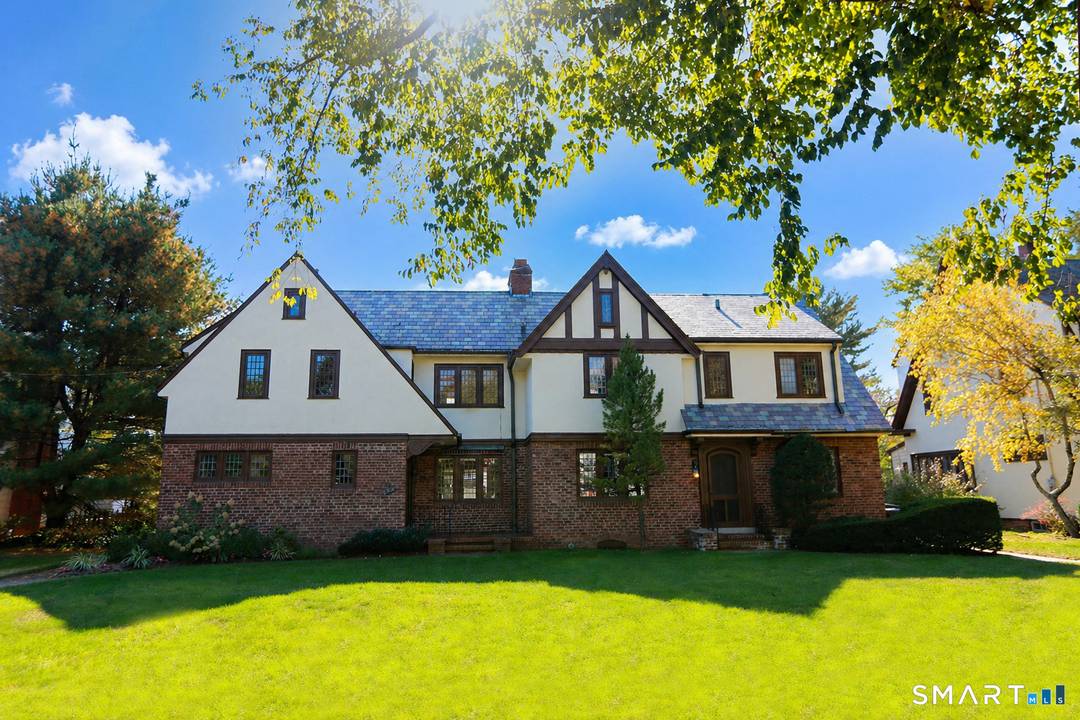 Exceptional opportunity to own a distinctive 1925 Tudor Revival Duplex in a highly desirable location.