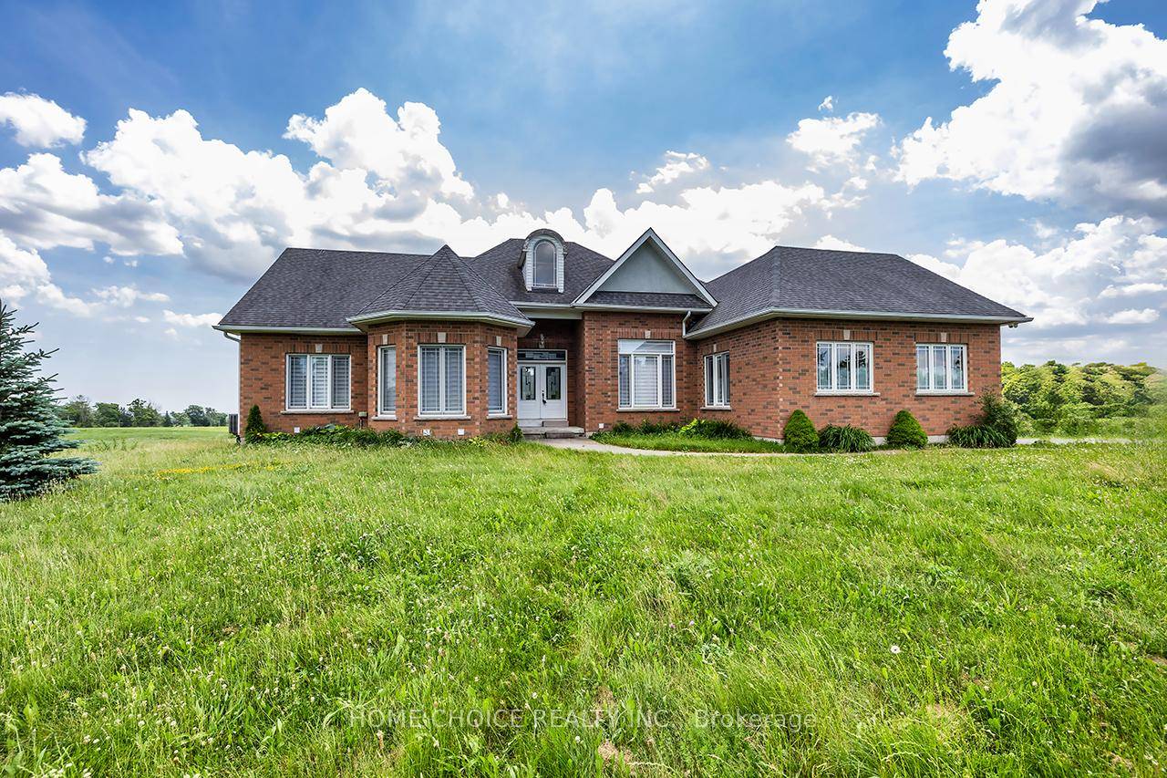 Discover this stunning and picturesque 54 acre property, featuring an exquisite custom built bungalow that embodies serenity and tranquility.