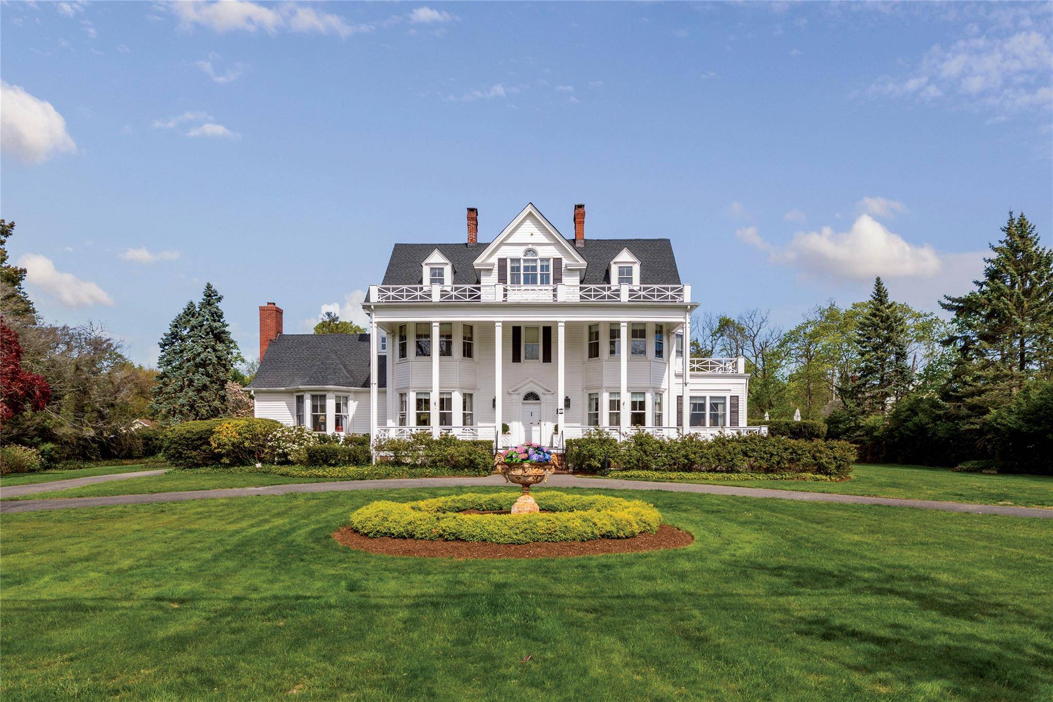 Step into timeless elegance with this stately 9 bedroom 4.