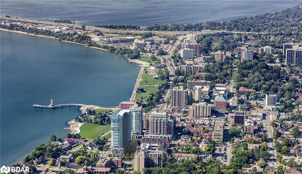 Welcome to luxurious living at its best in this corner sun filled unit with a view of the Lake amp ; City.