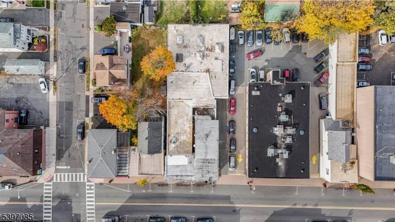 Prime mixed use income property featuring a warehouse, storefront, and three apartments in the heart of Nutley's vibrant Franklin Avenue corridor.