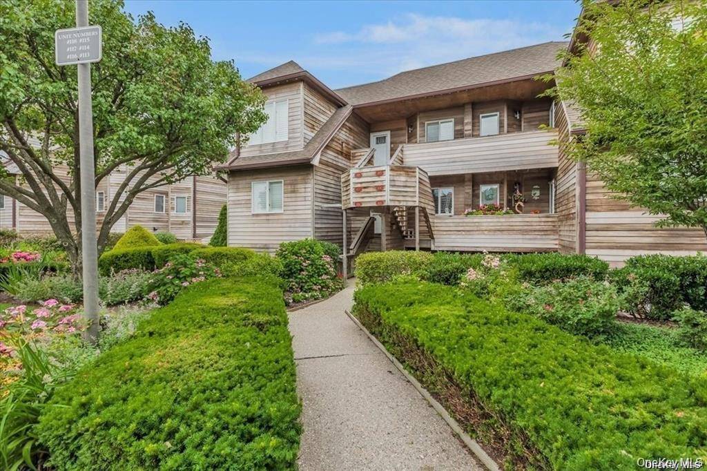 This rarely available end unit at the Bluffs in Baiting Hollow offers amazing views of the Long Island Sound.