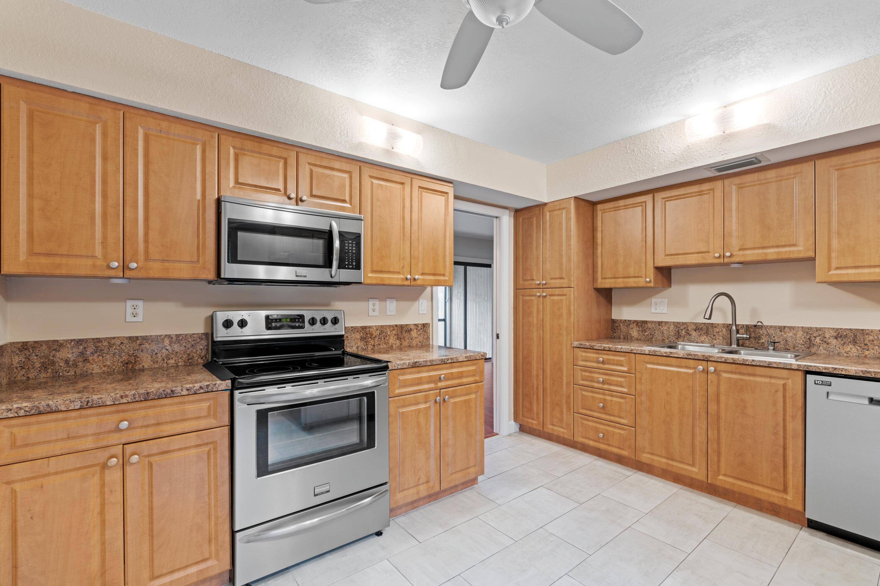 Nestled in the heart of Boca Raton is this beautiful, spacious, meticulously maintained, updated and freshly painted, ground floor, two bedroom, two bathroom condo in the 55 community of Woodhaven.