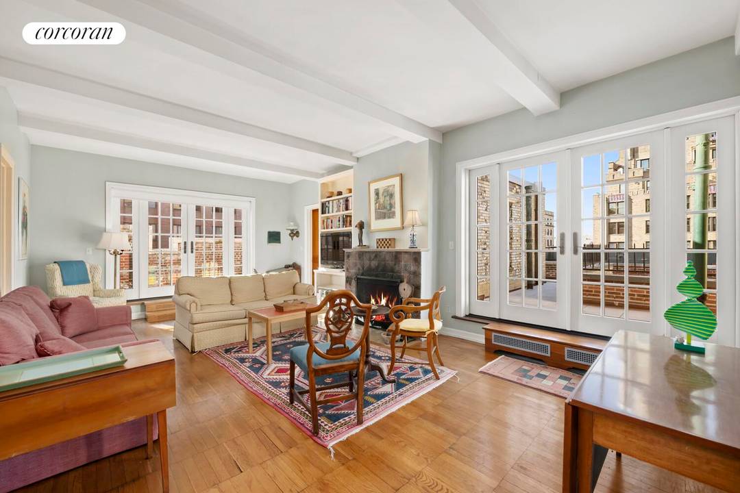 Featuring a wide wrap terrace with large and rarely found south, east, and west facing areas, this distinctive 2BR, 2BA Carnegie Hill prewar penthouse apartment with wood burning fireplace exemplifies ...