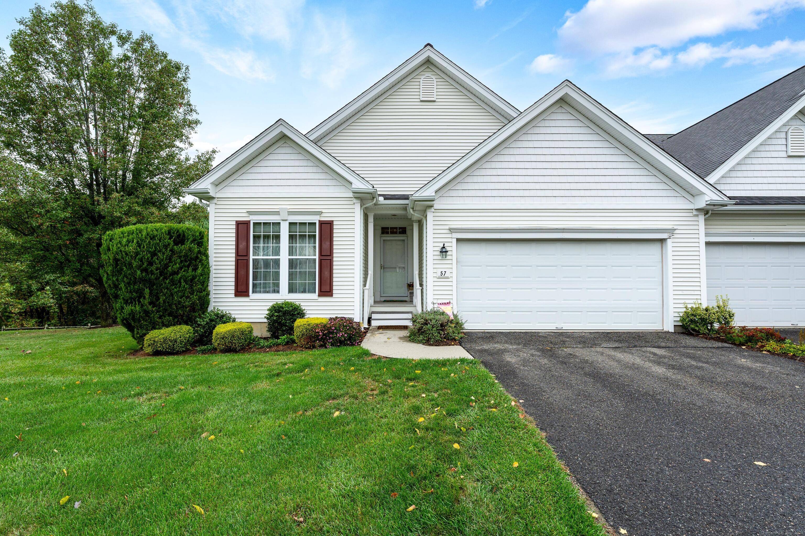 Charming Two Bedroom Condo Located At The Desirable Carlson Ridge Community.