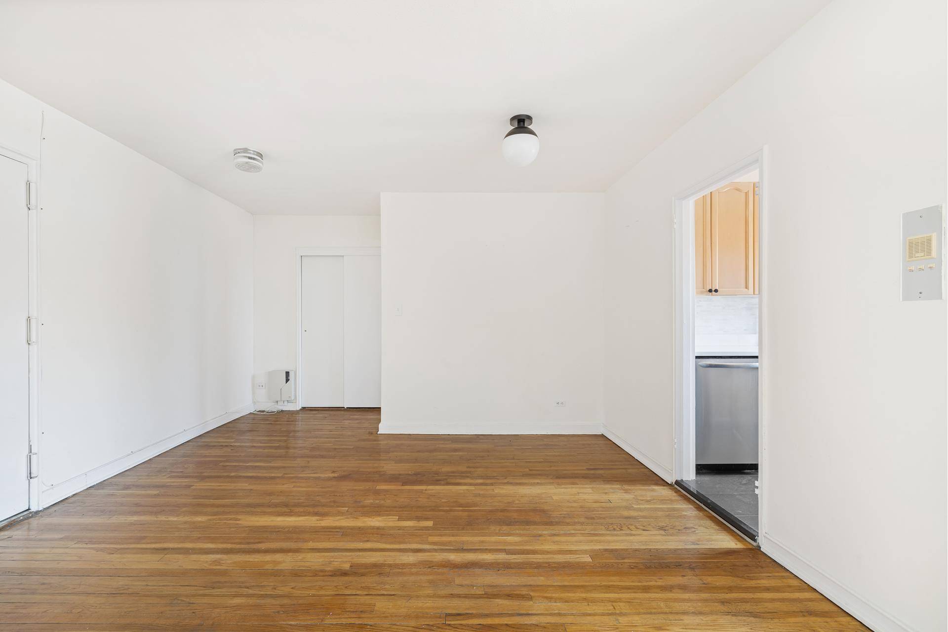 Bright and sunny, top floor one bedroom home with a bonus room !