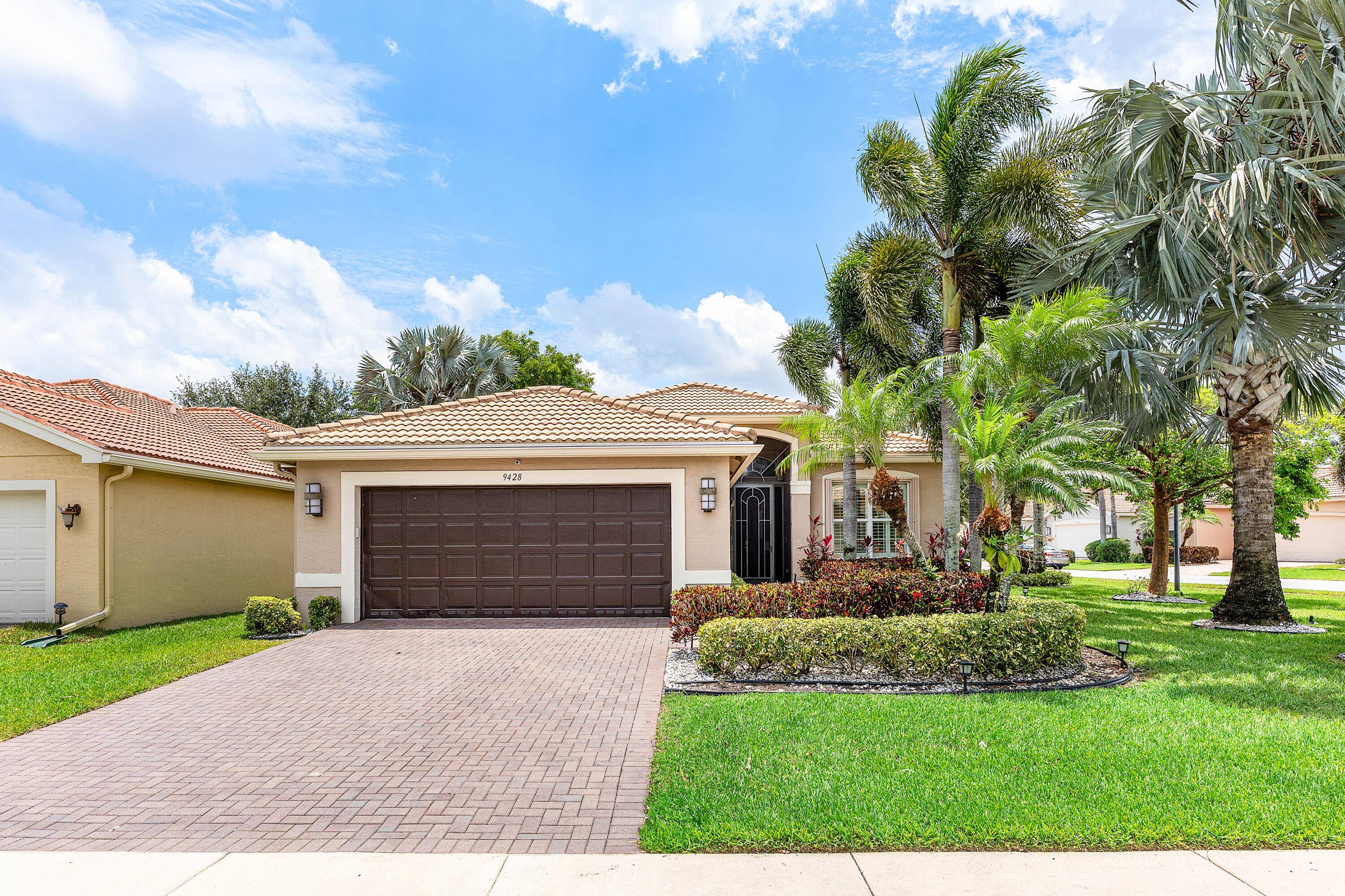 This beautifully appointed Isabelle model 2 2 den sits on an oversized corner lot backing south.