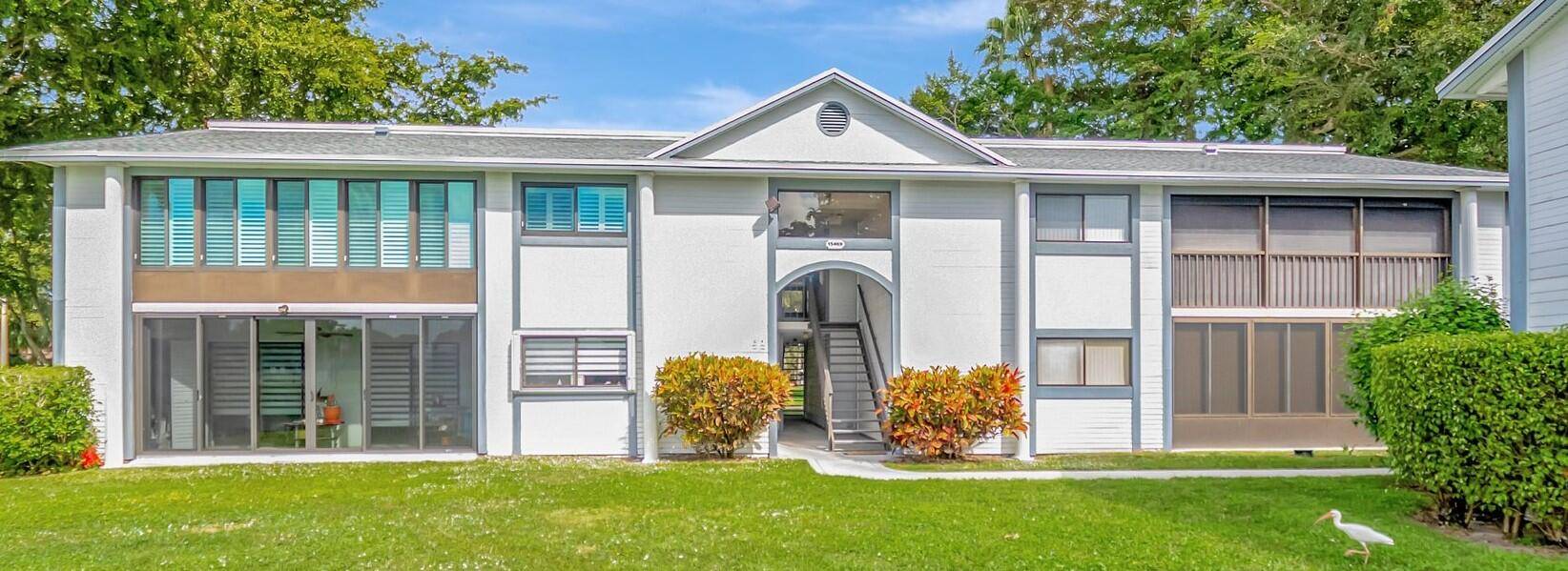 This lovely, move in ready Waterfront condo is perfectly located right next to the clubhouse and the main pool in the friendly and active adult community of Lakes of Delray.