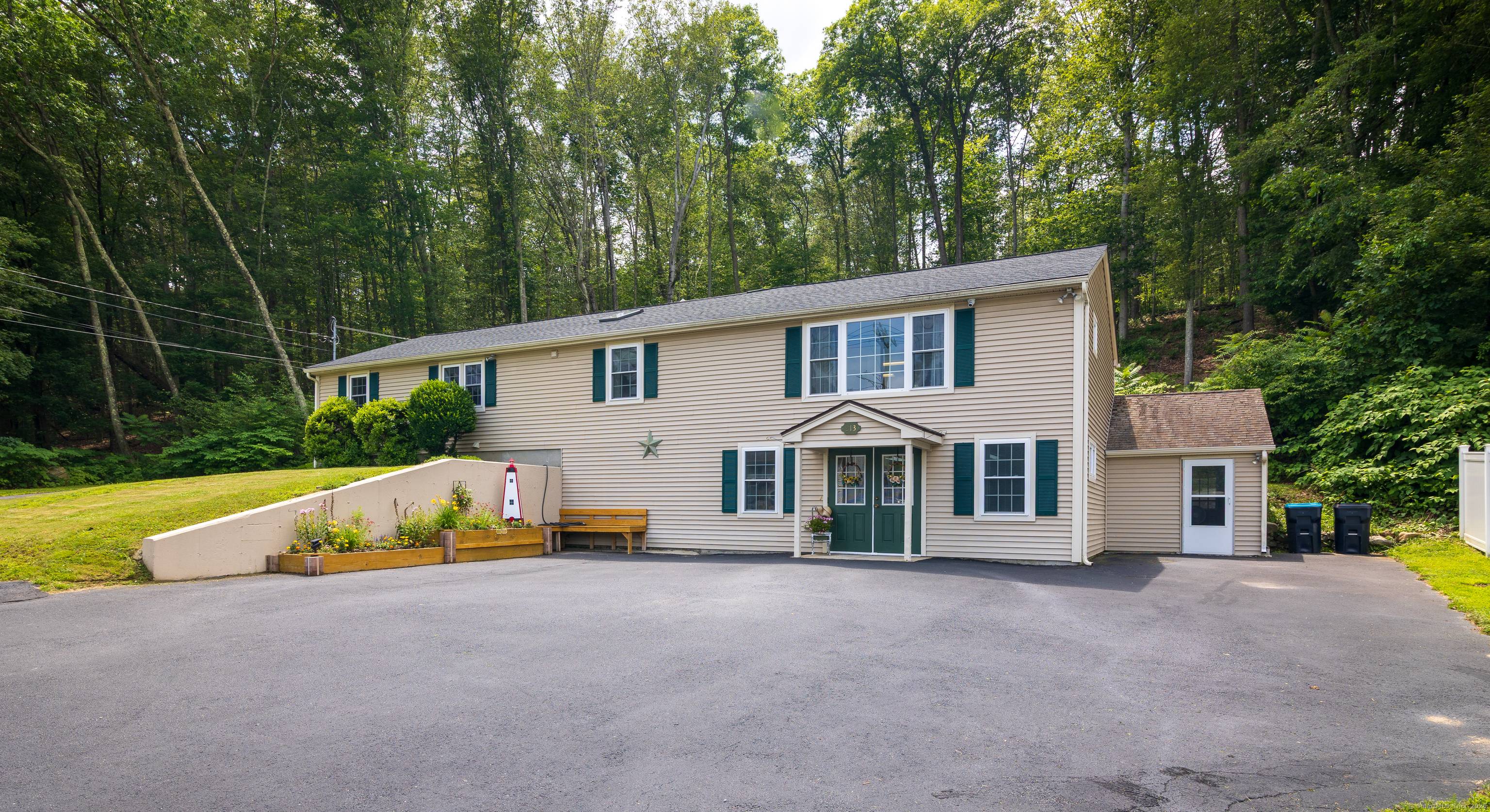 This renovated home with IN LAW POTENTIAL in Putnam has been completely transformed from a former mixed use property into a spacious, fully residential home.
