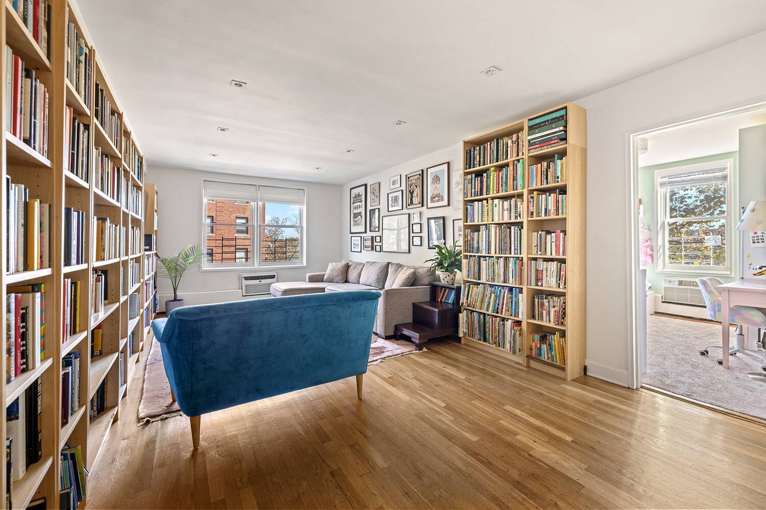 Spacious, light filled three bedroom, two bath home boasts beautiful hardwood floors, three exposures east, west, and north, and an abundance of closet space !