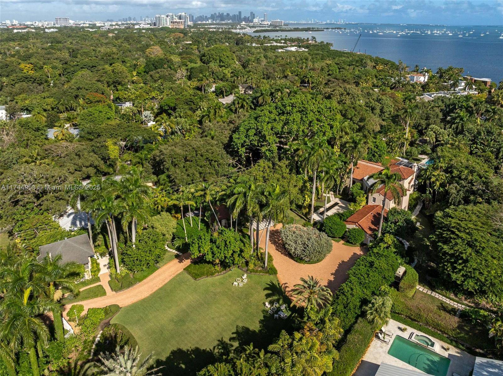Coconut Grove De Garmo architectural masterpiece on over 2 acres of private dramatically lit botanic gardens has captivated hearts amp ; headlines for nearly a century.