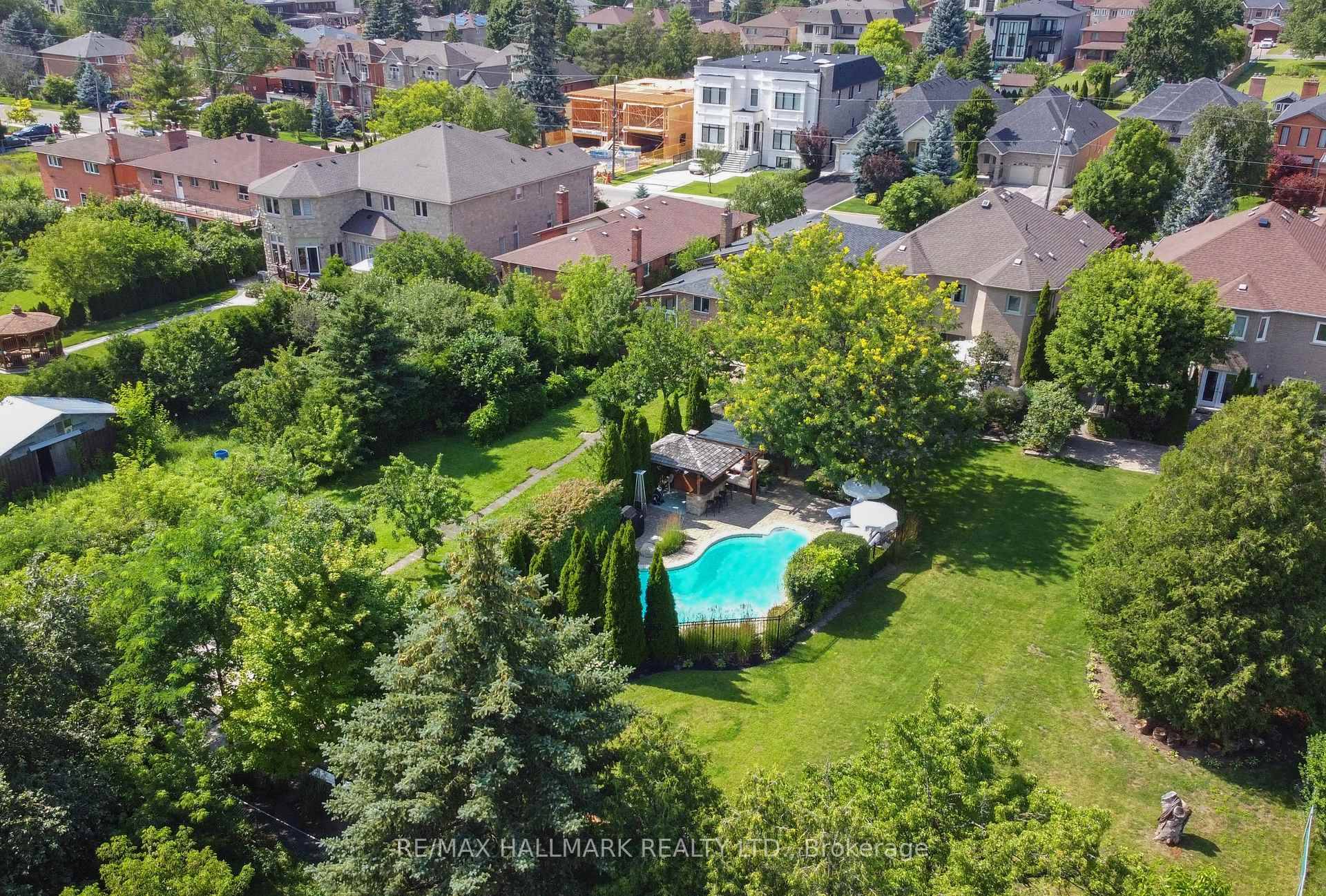 Stunning Four Bedroom Contemporary Home On Spacious Deep Lot, 246' With Gated, Inground Salt Water Pool and Beautifully Manicured Lawns Complete With Irrigation System.