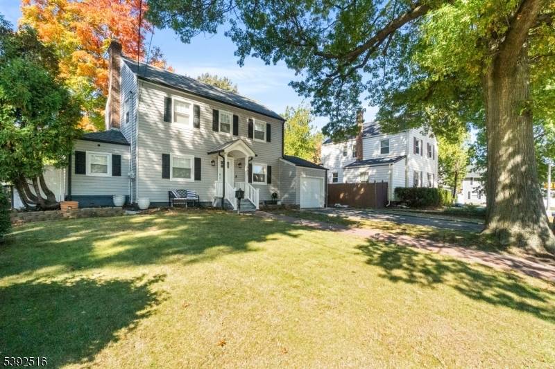 Welcome to this beautifully maintained two story Colonial style home, exuding timeless charm and warmth.