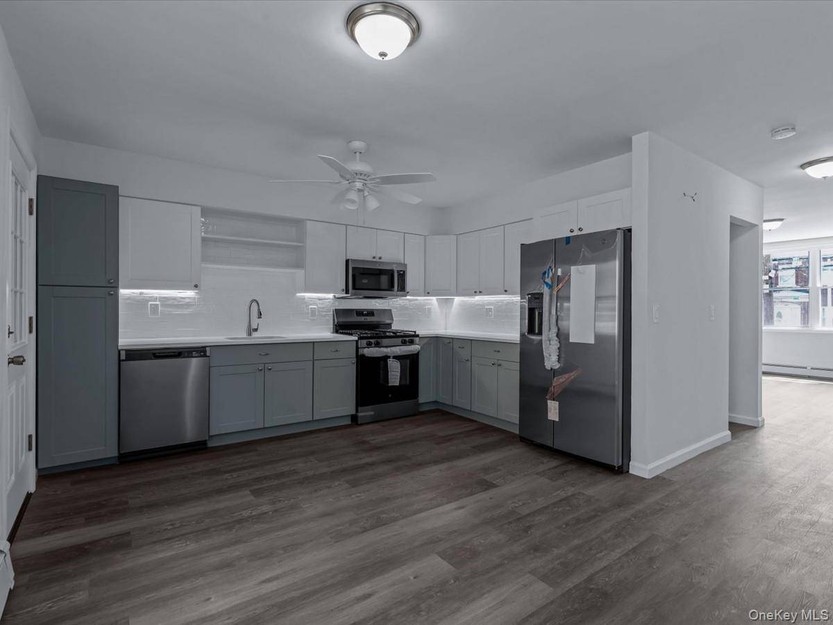 Step into this fully renovated brick single family home in the heart of Pelham Bay.