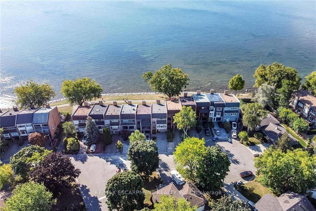 On the Lake ! Luxurious waterfront townhome remodeled top to bottom in Bronte Village.